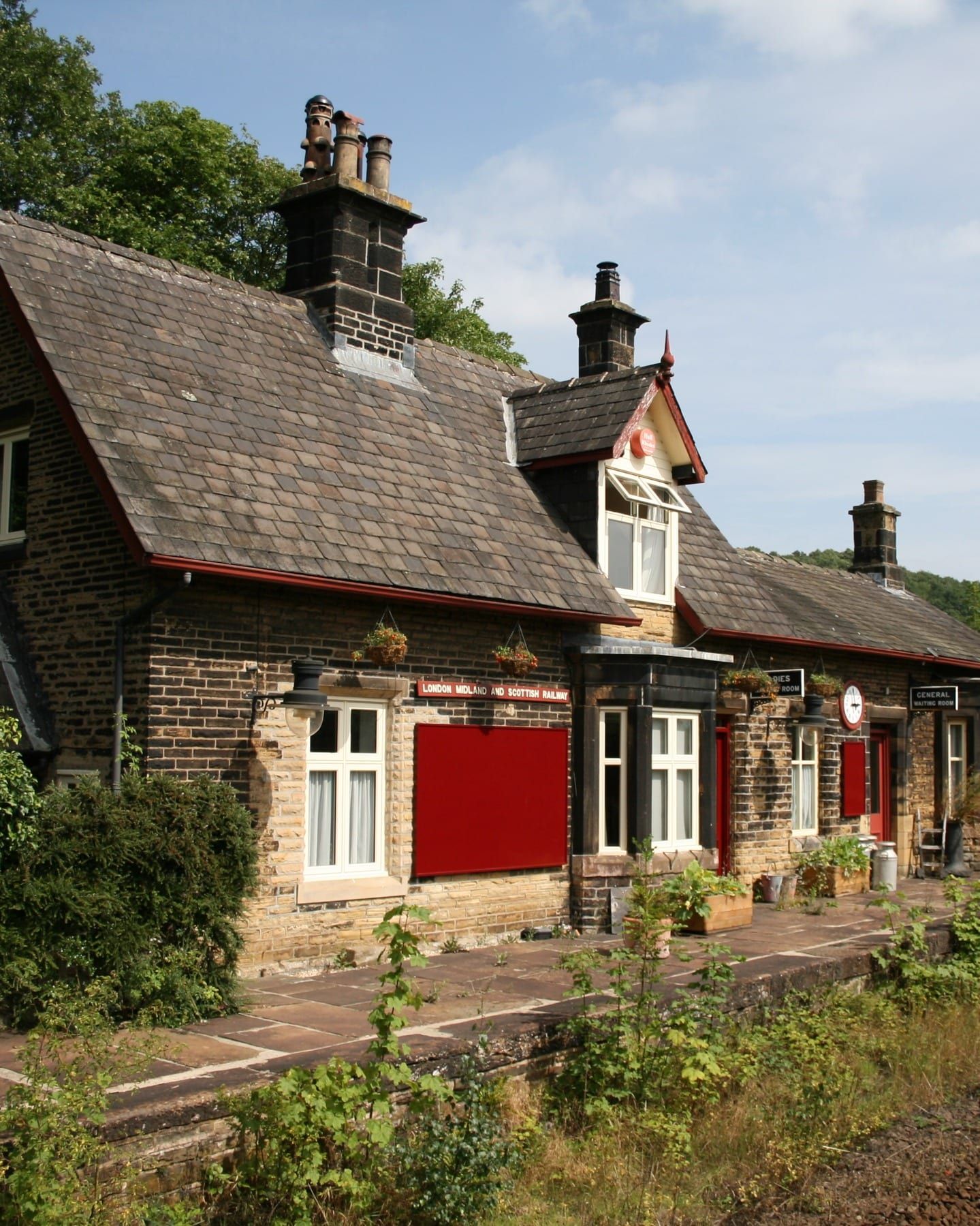 Side view of converted station house showing new period-style timber windows
